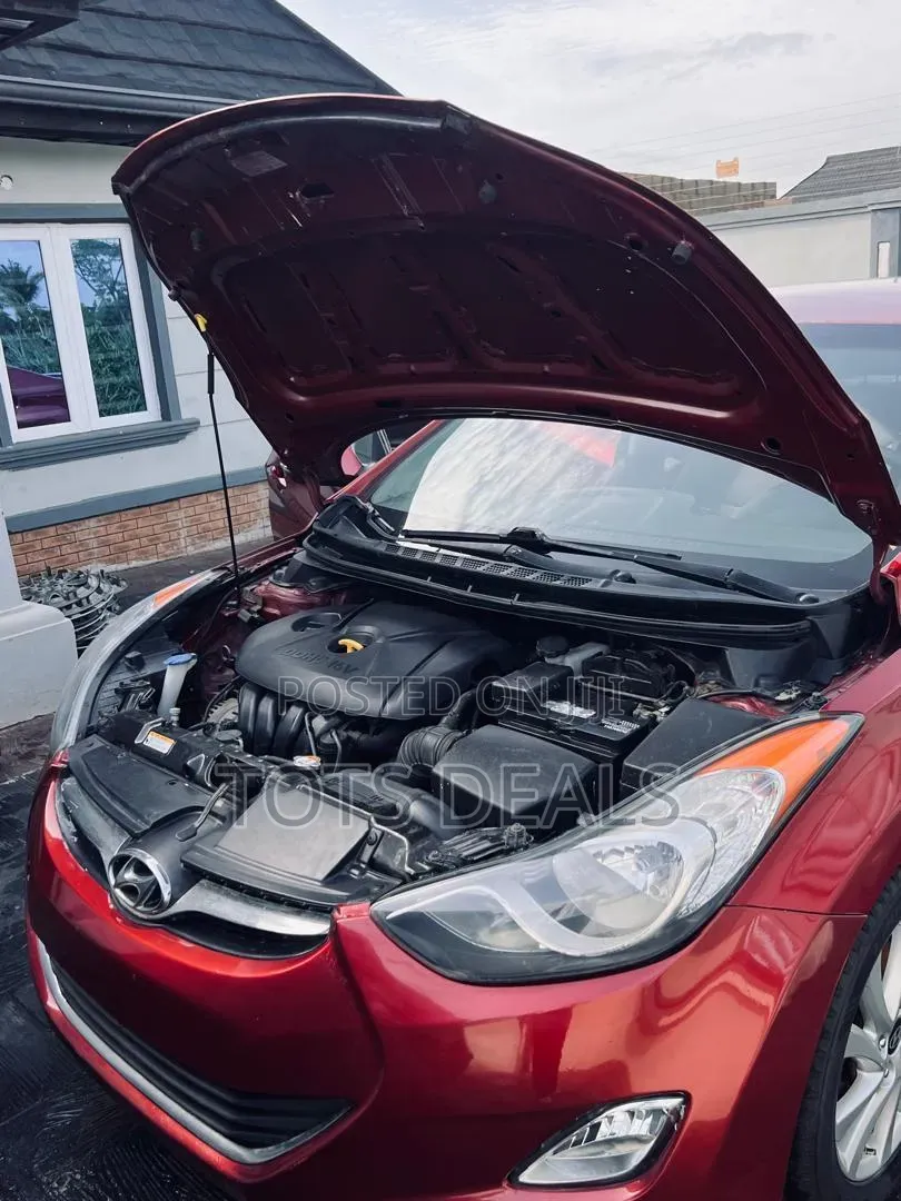 Hyundai Elantra GLS Sedan FWD (1.8L 4cyl 6A) 2013 Red