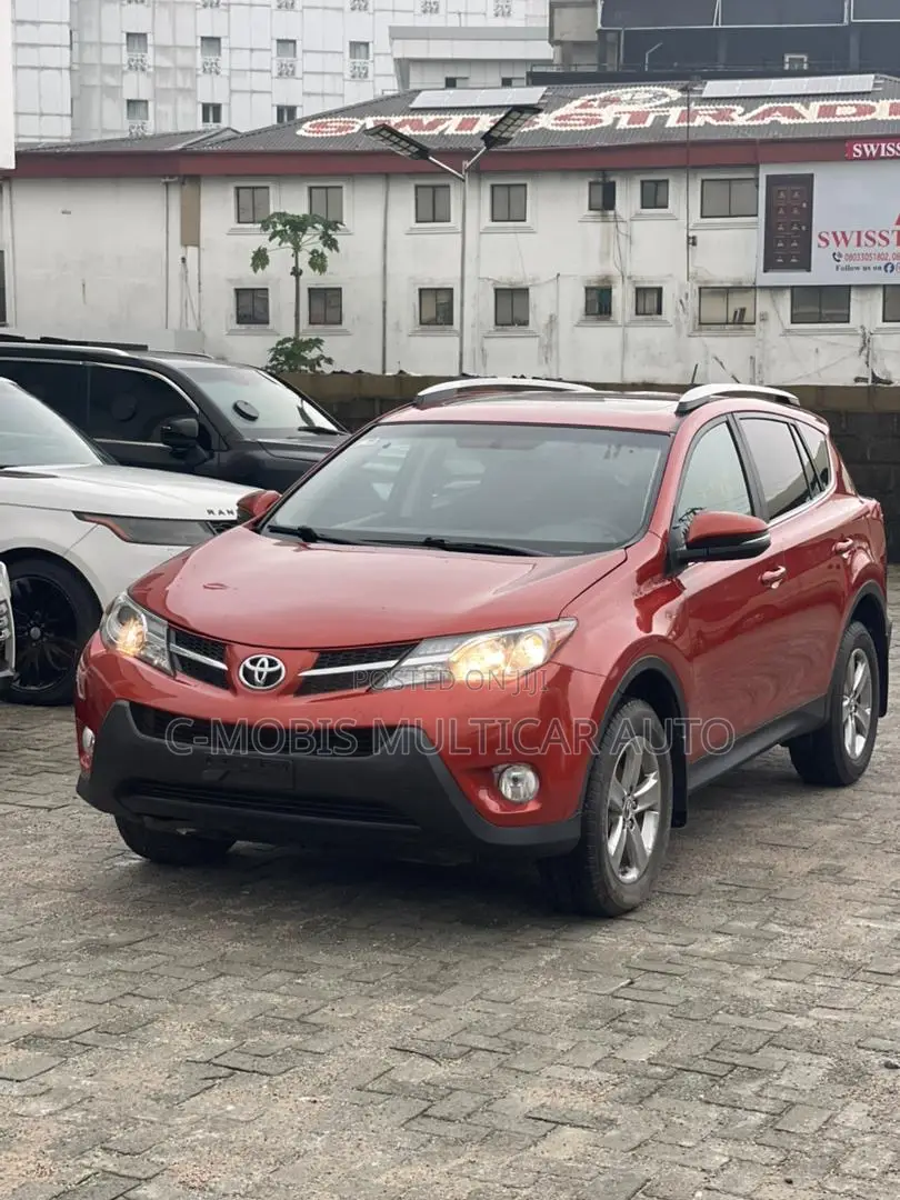 Toyota RAV4 XLE 4dr SUV AWD (2.5L 4cyl 6A) 2015 Orange