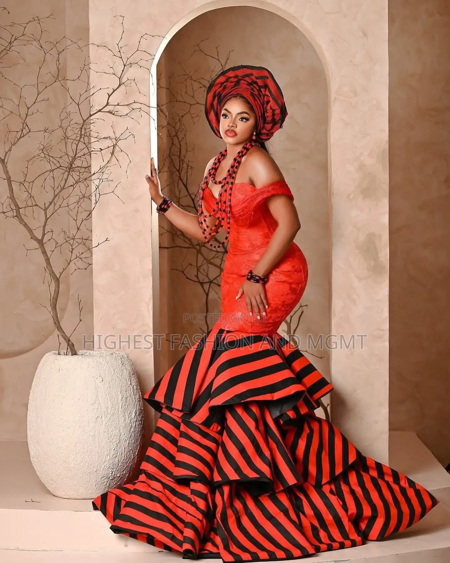 Elite Tiv-Inspired Red and Tiered Mermaid Bridal Gown With Gele