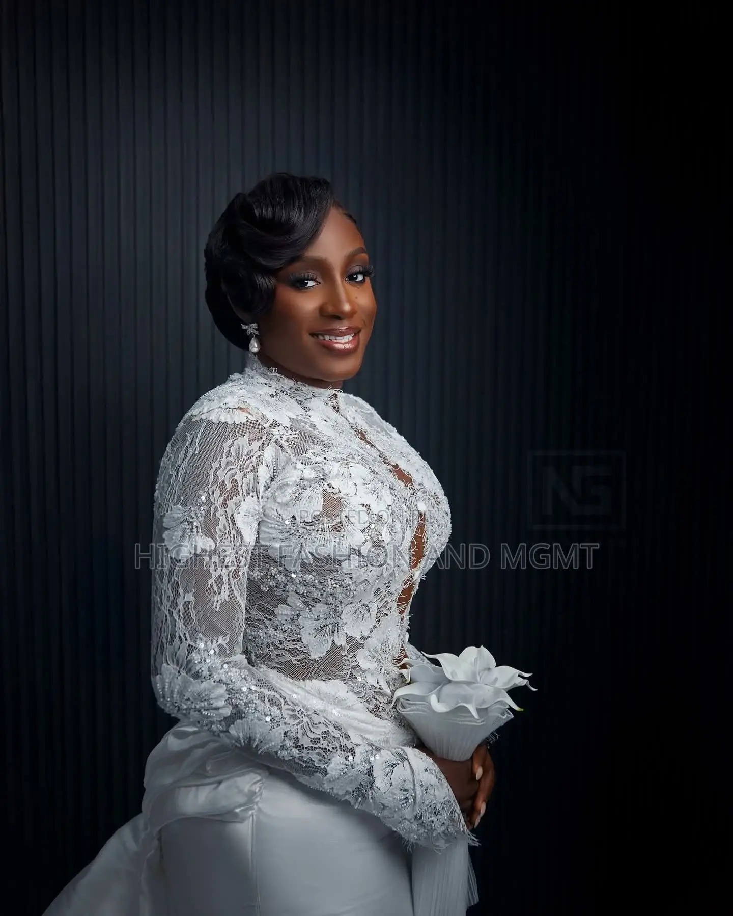 Long-Sleeve Illusion Lace Bridal Dress With Structural Satin Skirt