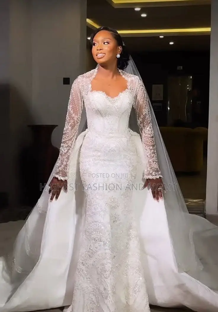Long-Sleeve Patterned Lace Bridal Dress and Detachable Cathedral Train