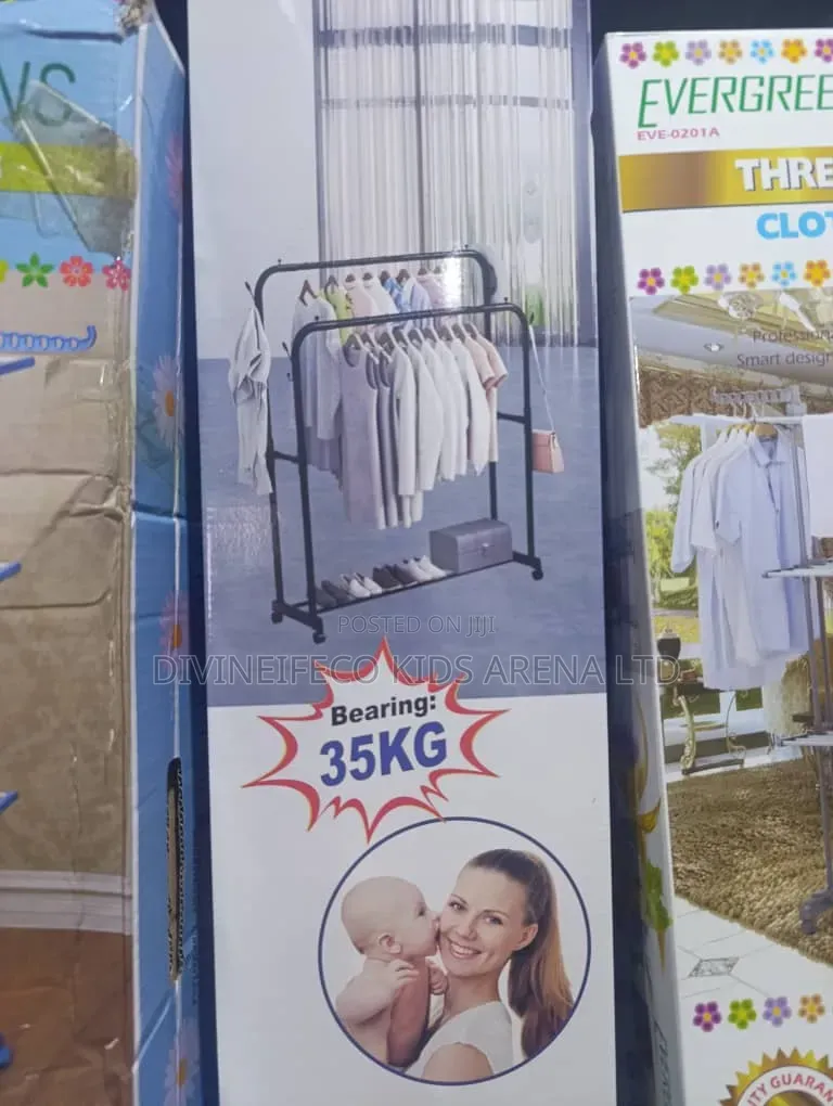 Double Pole Rolling Garment Rack With Shelf Wheels 35kg