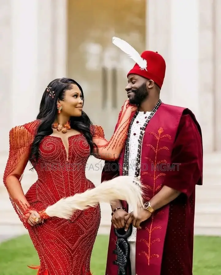 Luxury Coral Beaded Igbo Bridal Gown With Feathers