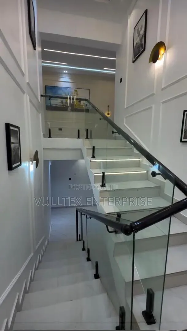 Glass Rail With Black Hand Rail