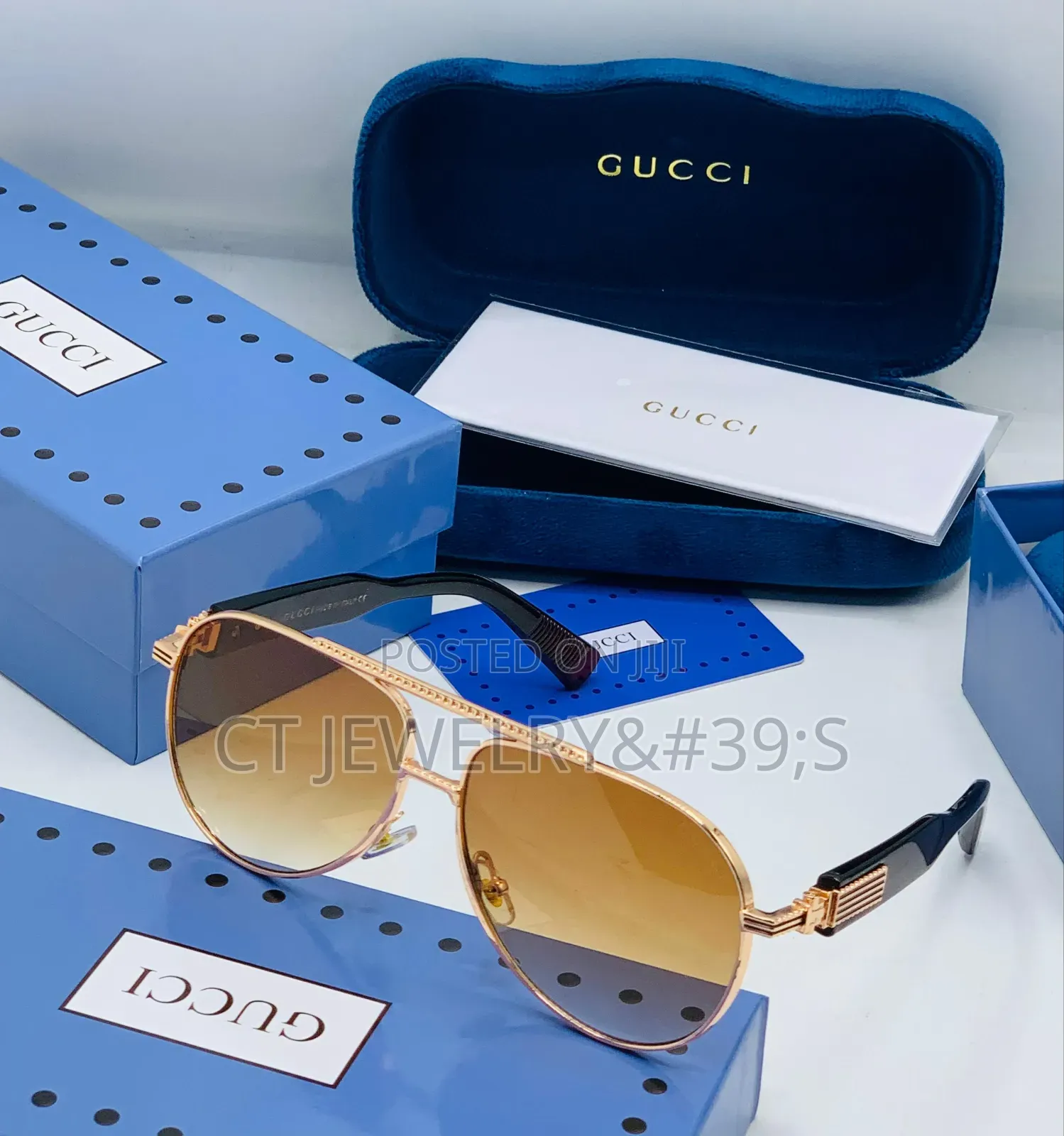 Original Gucci Sunglasses a Gold Metal Frame and Black Temples