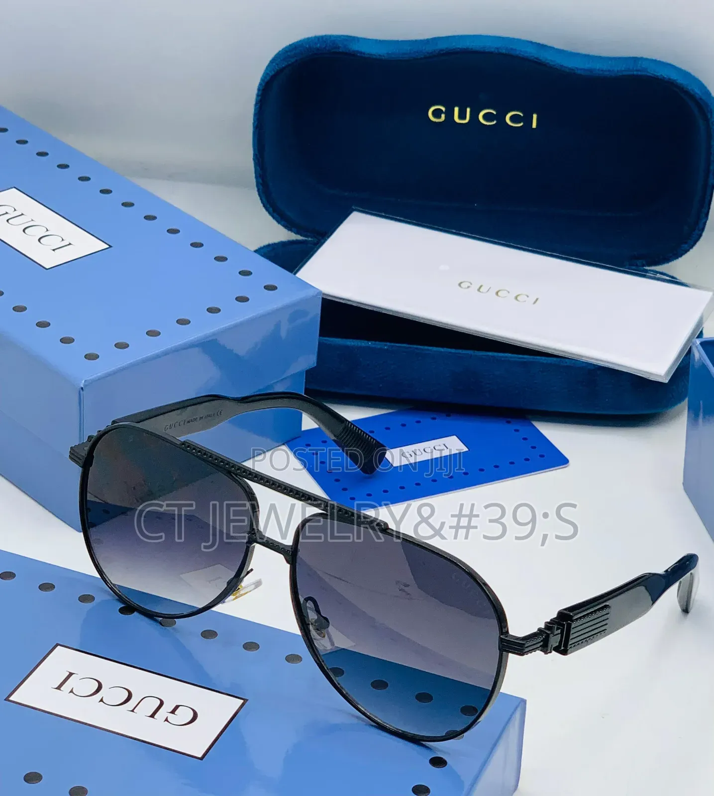 Original Gucci Sunglasses a Gold Metal Frame and Black Temples