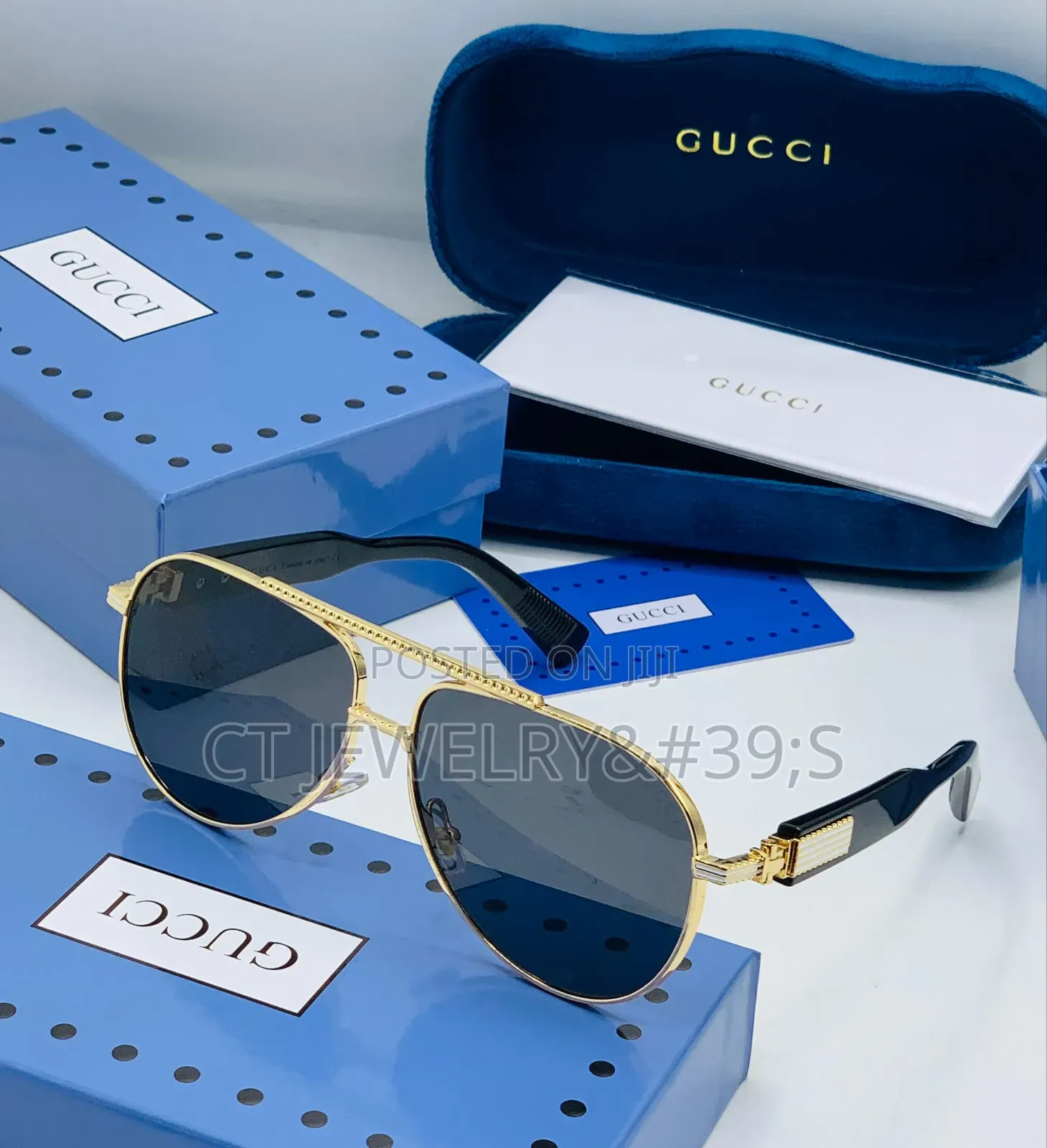 Original Gucci Sunglasses a Gold Metal Frame and Black Temples