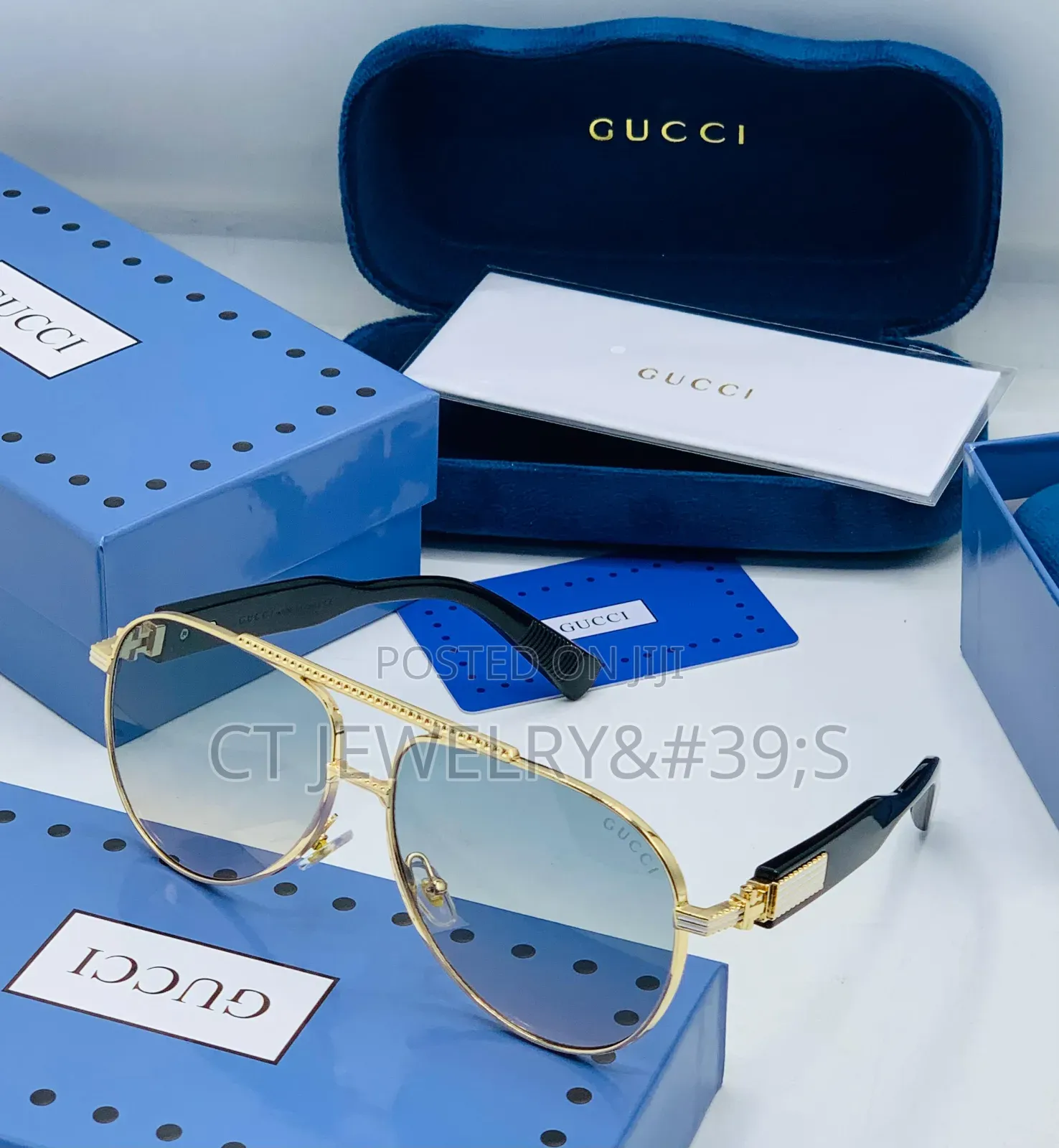 Original Gucci Sunglasses a Gold Metal Frame and Black Temples