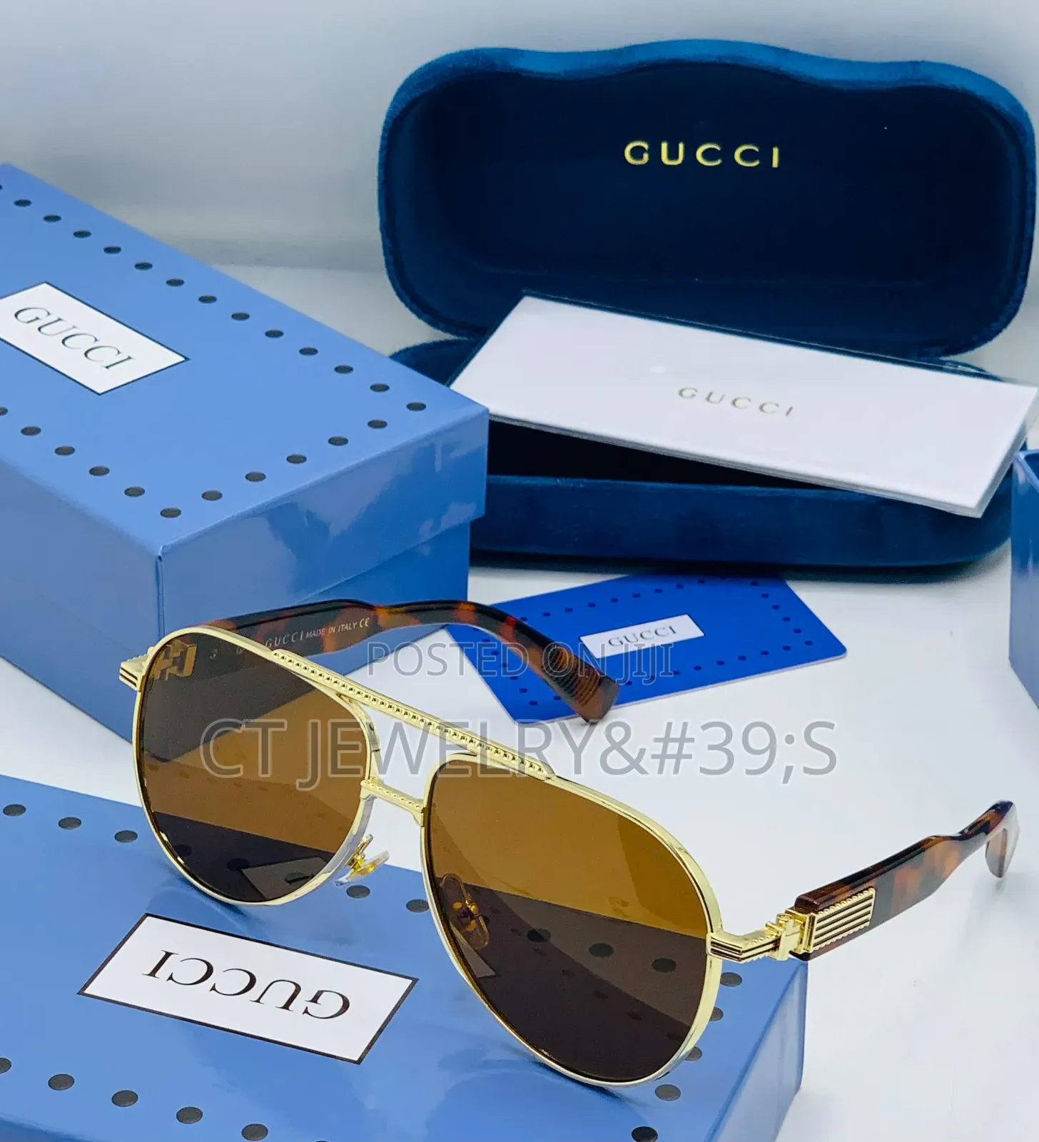 Original Gucci Sunglasses a Gold Metal Frame and Black Temples