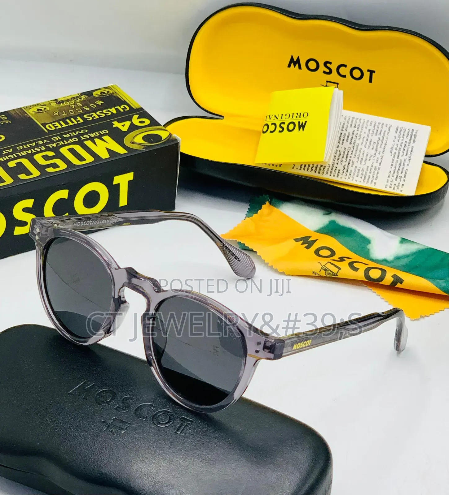 Luxury Moscot Branded Sunglasses Black Frame and Light Tinted Lenses.