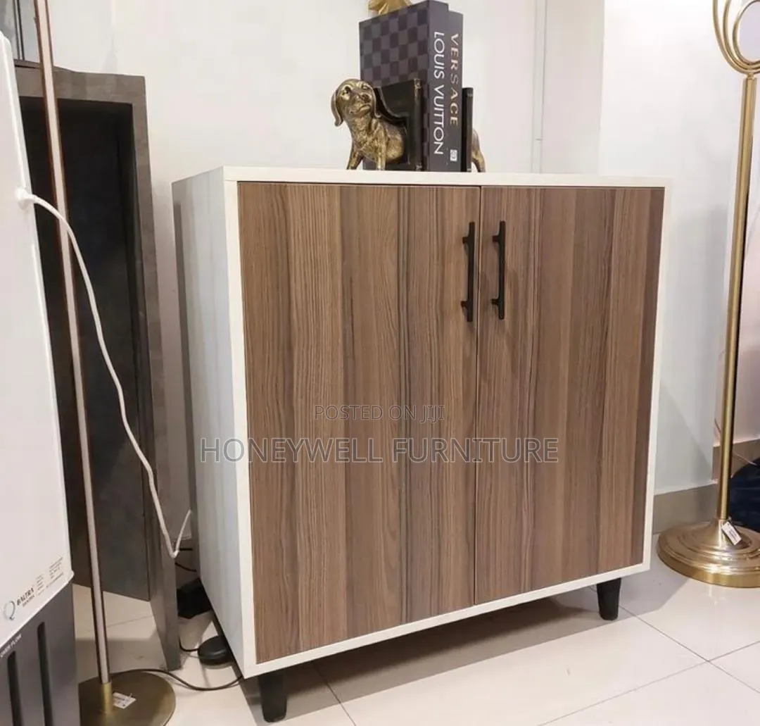 Brown and White Bedroom Cabinet With Doors