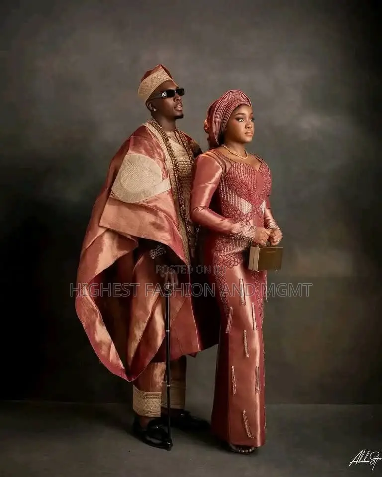 Rose Gold Silk Agbada Corset Gown With Detachable Royal Cape Set