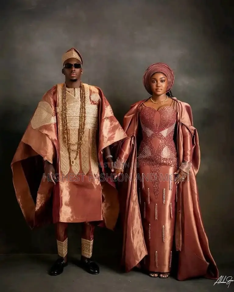 Rose Gold Silk Agbada Corset Gown With Detachable Royal Cape Set