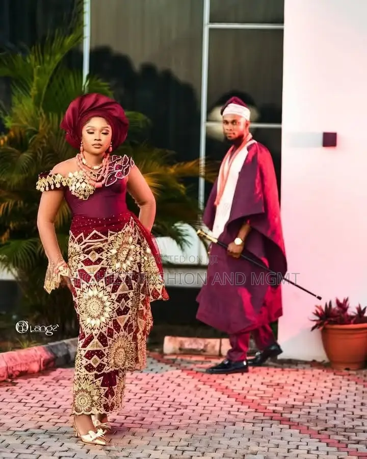 Burgundy-and-Gold Traditional Cultural Wedding Couple Set.