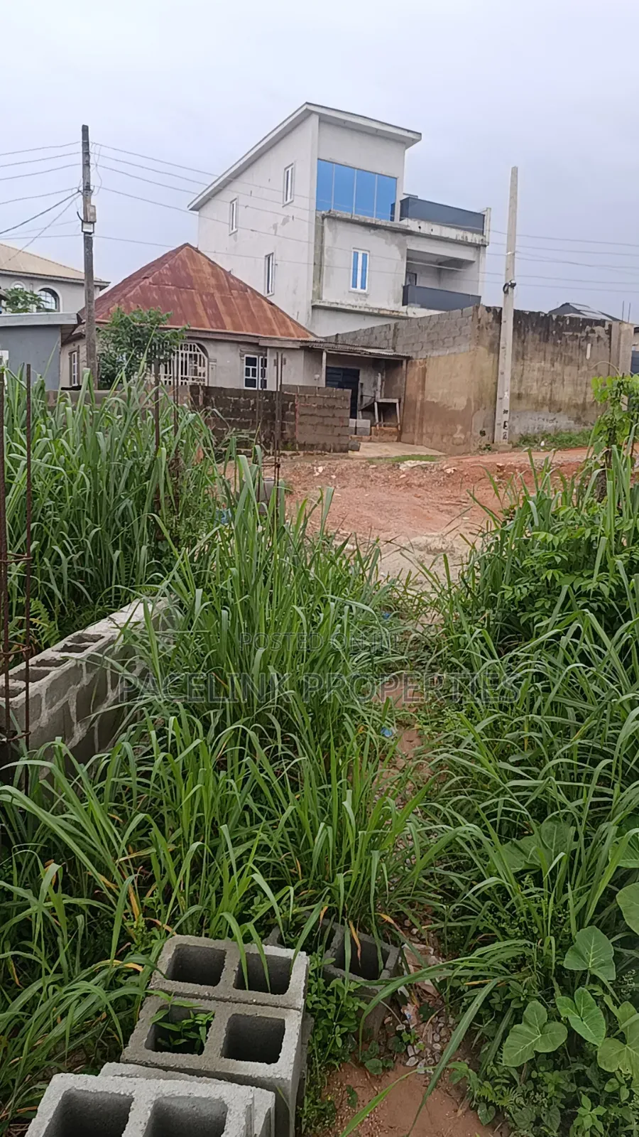 Half Plot of Land With Foundation on It 30 by 120ft in a Decent Area.