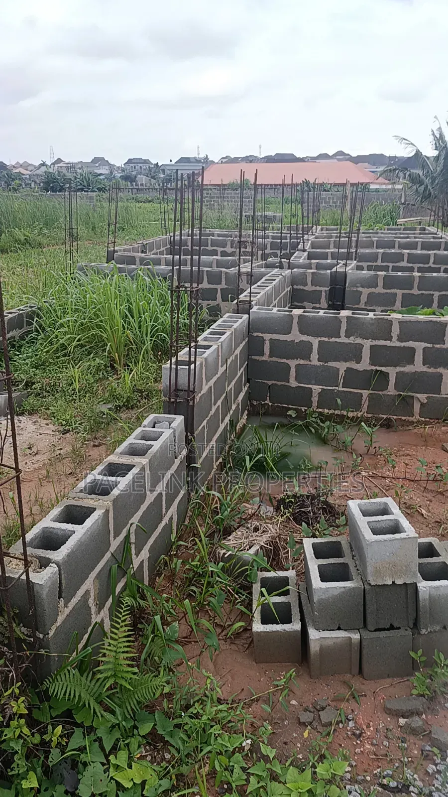 Half Plot of Land With Foundation on It 30 by 120ft in a Decent Area.