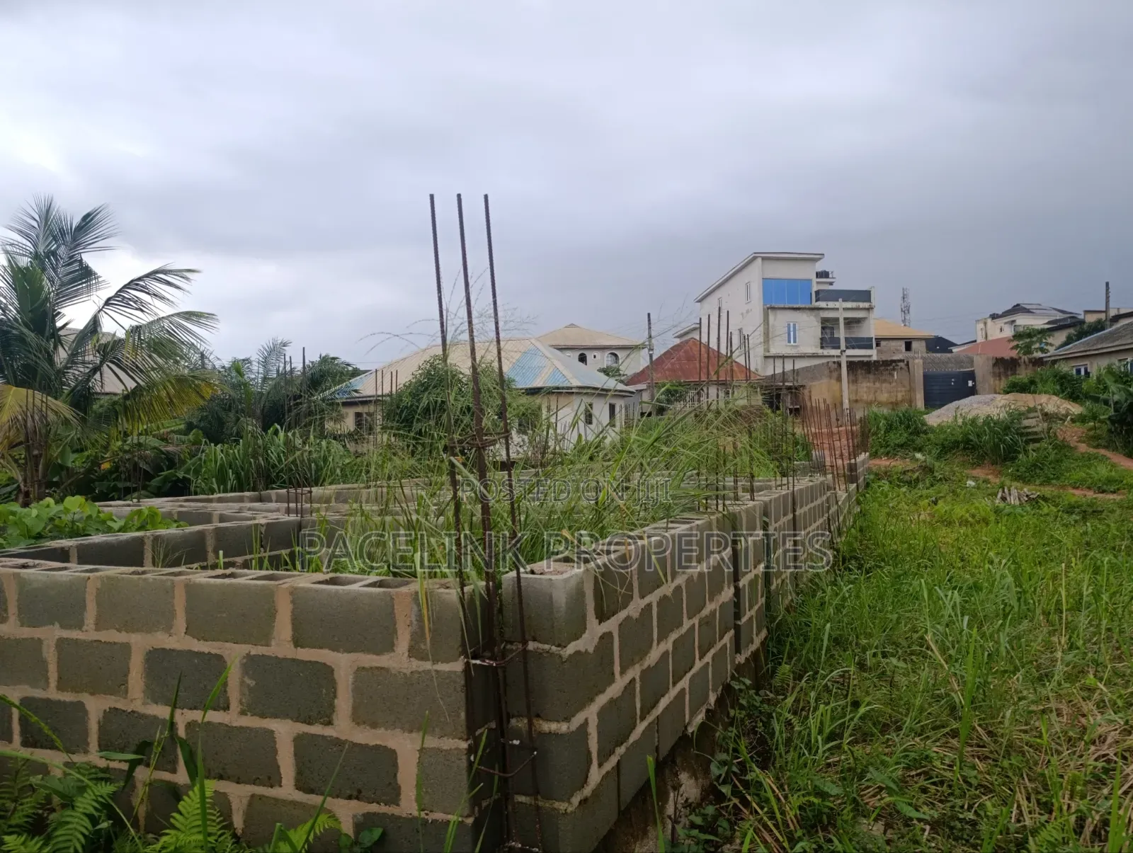 Half Plot of Land With Foundation on It 30 by 120ft in a Decent Area.