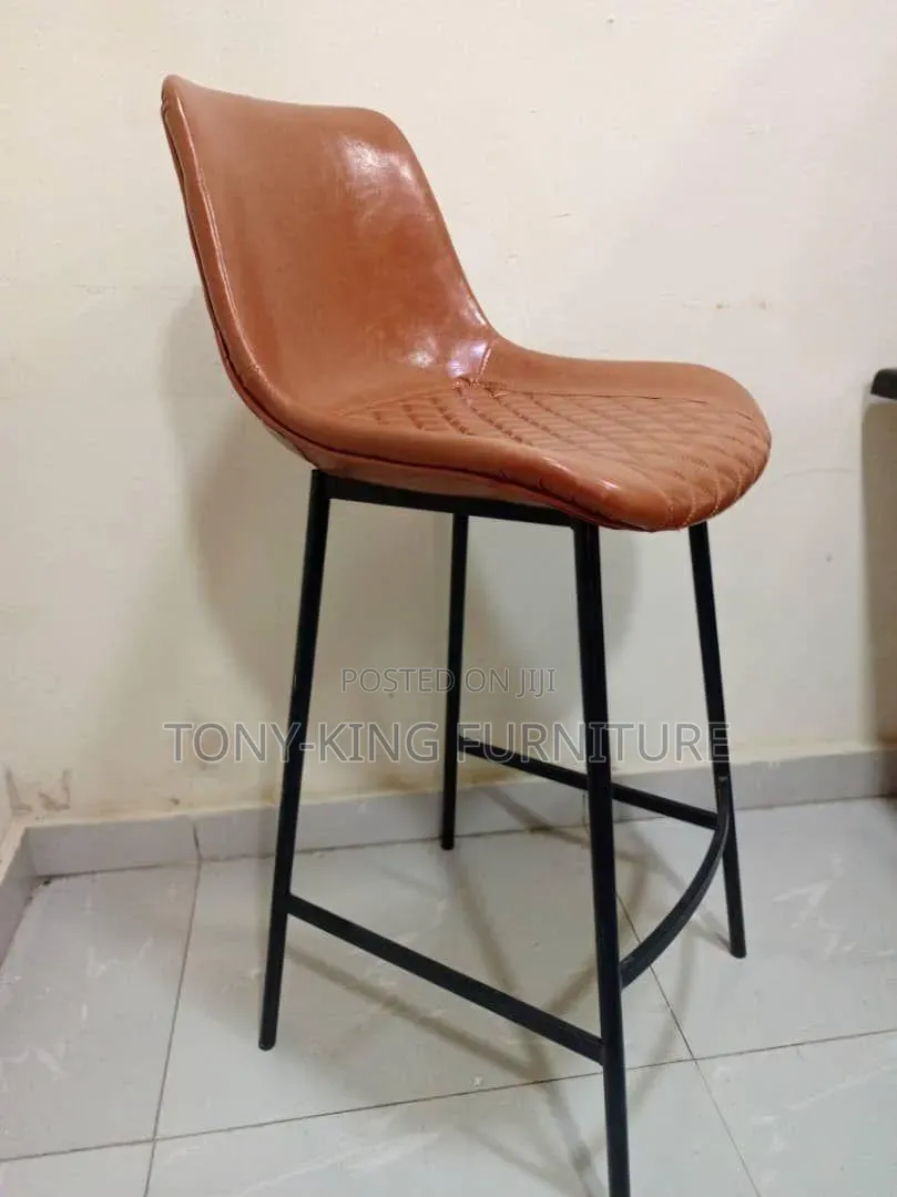 Imported Faux Leather Bar Stool a Quilted Diamond-Patterned Seat.