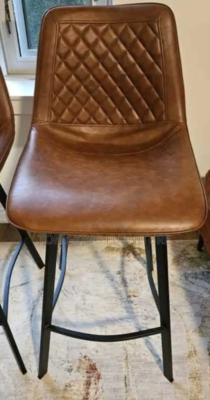 Imported Faux Leather Bar Stool a Quilted Diamond-Patterned Seat.