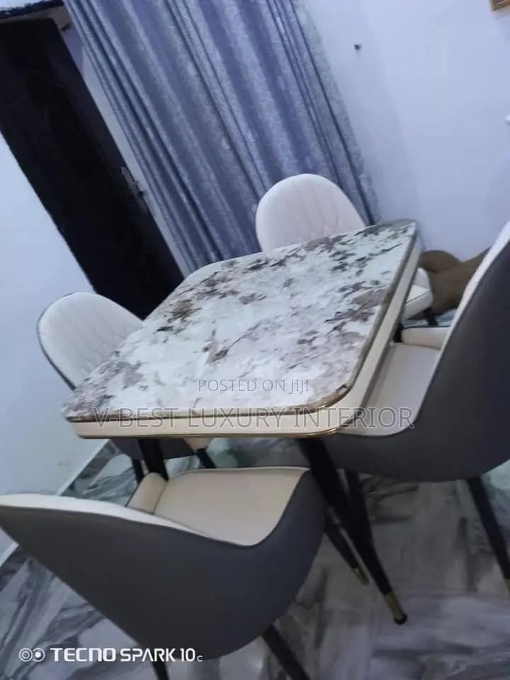 Luxury 4-Seater Faux Marble Dining Set With Quilted Chairs