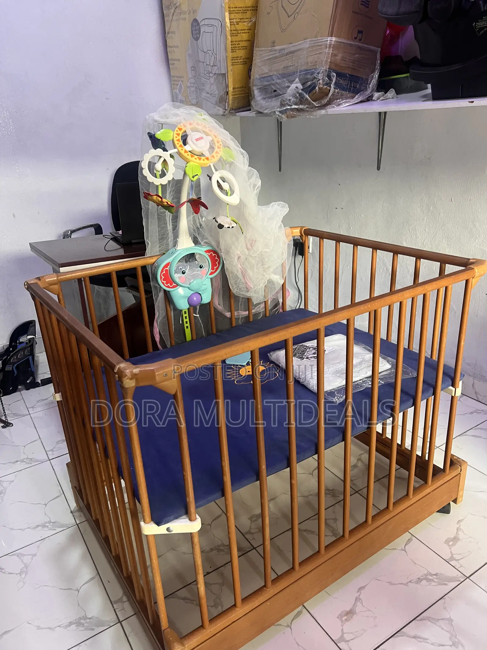 Imported Portable and Foldable Wooden Baby Crib With Musical Rattle