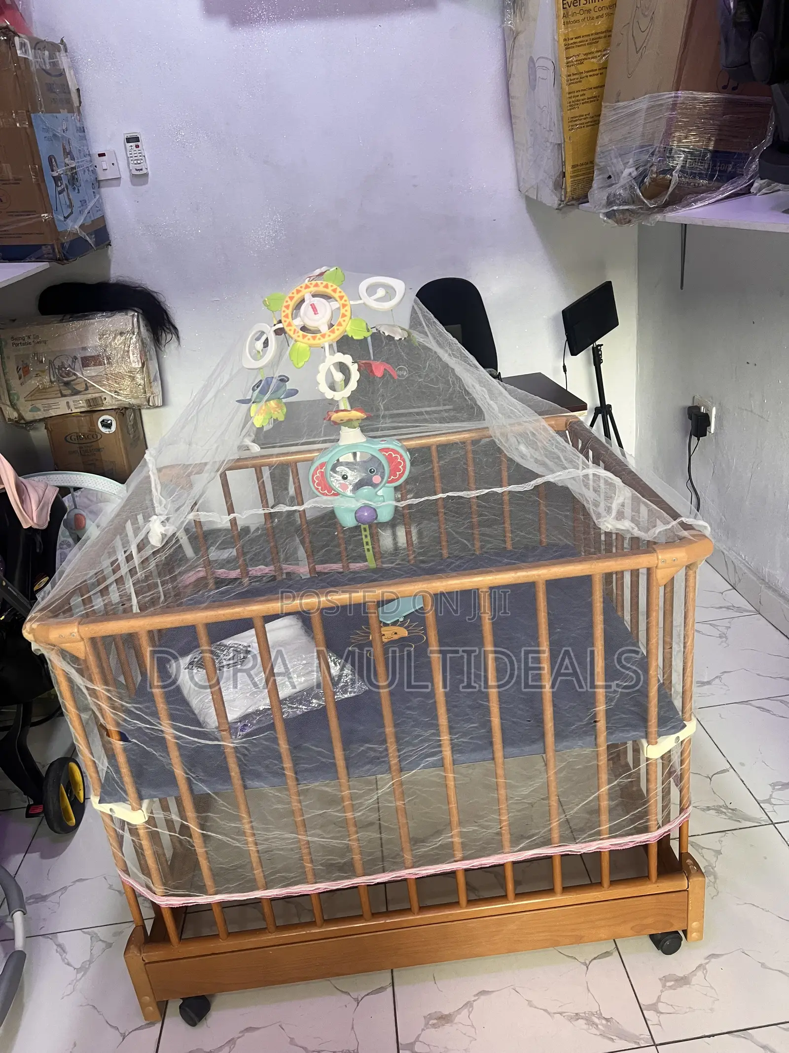 Imported Portable and Foldable Wooden Baby Crib With Musical Rattle