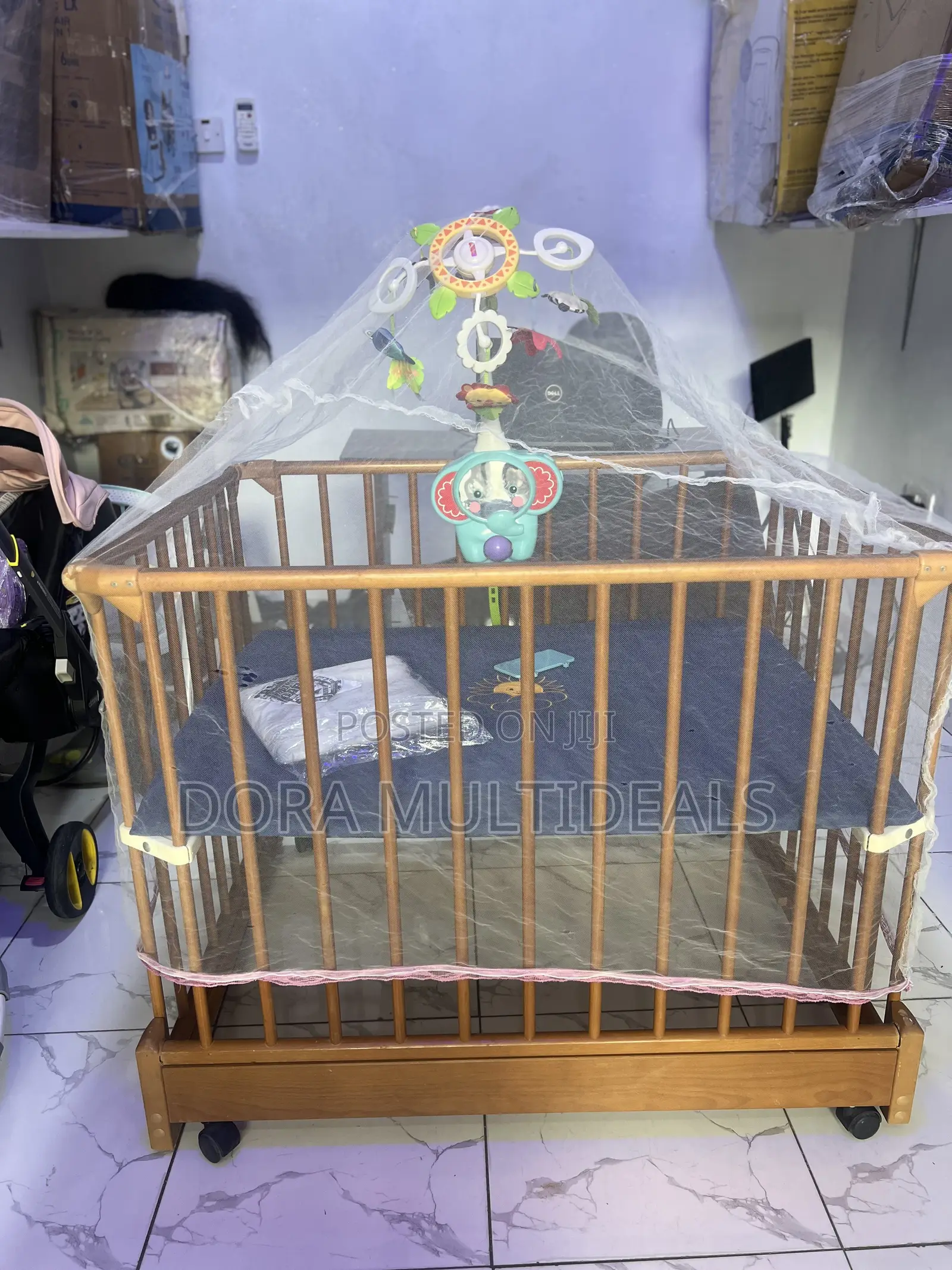 Imported Portable and Foldable Wooden Baby Crib With Musical Rattle
