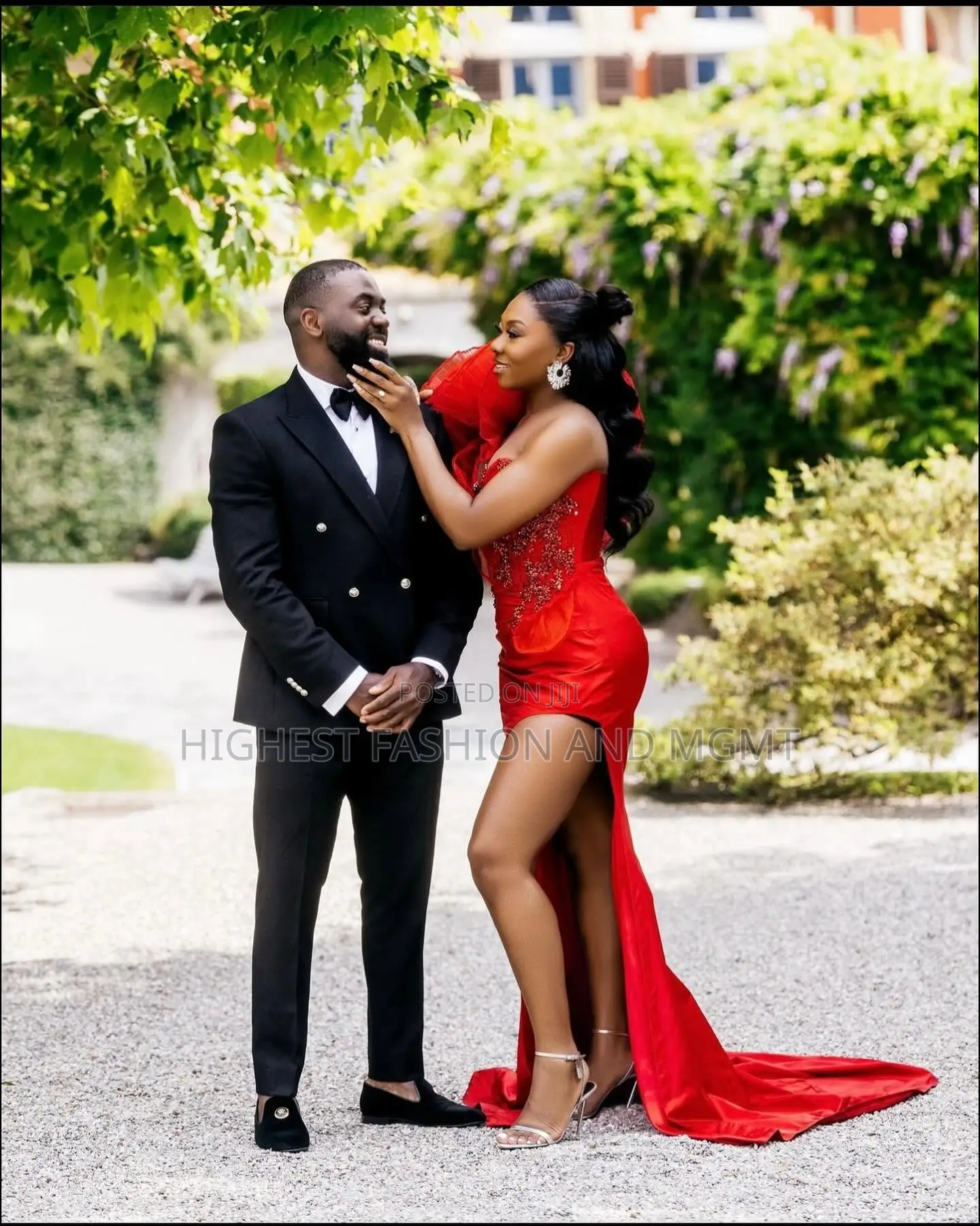 Red Split Leg Gown and Black Suit