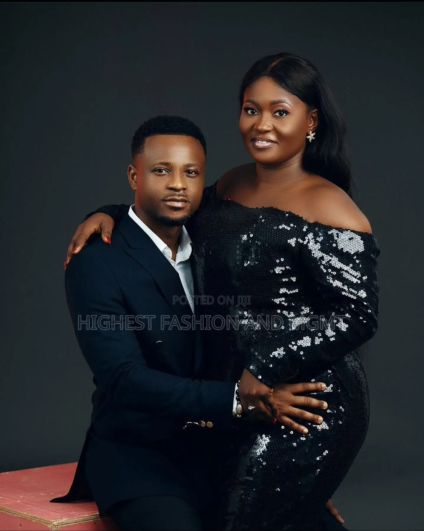 Black Sequin Gown and Navy Blue Double-Breasted Suit