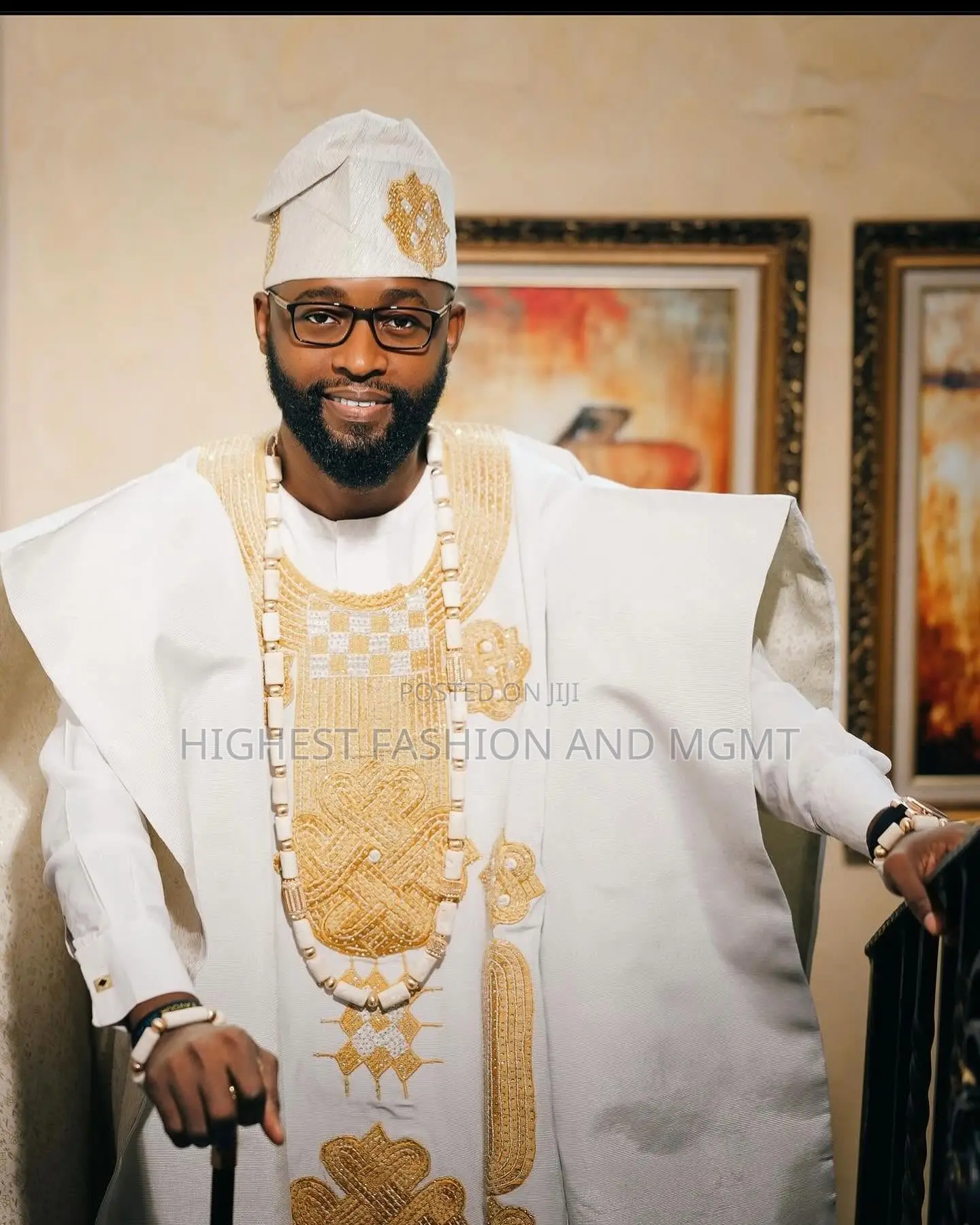 Embellished White Gown and White Agbada With Gold Accents