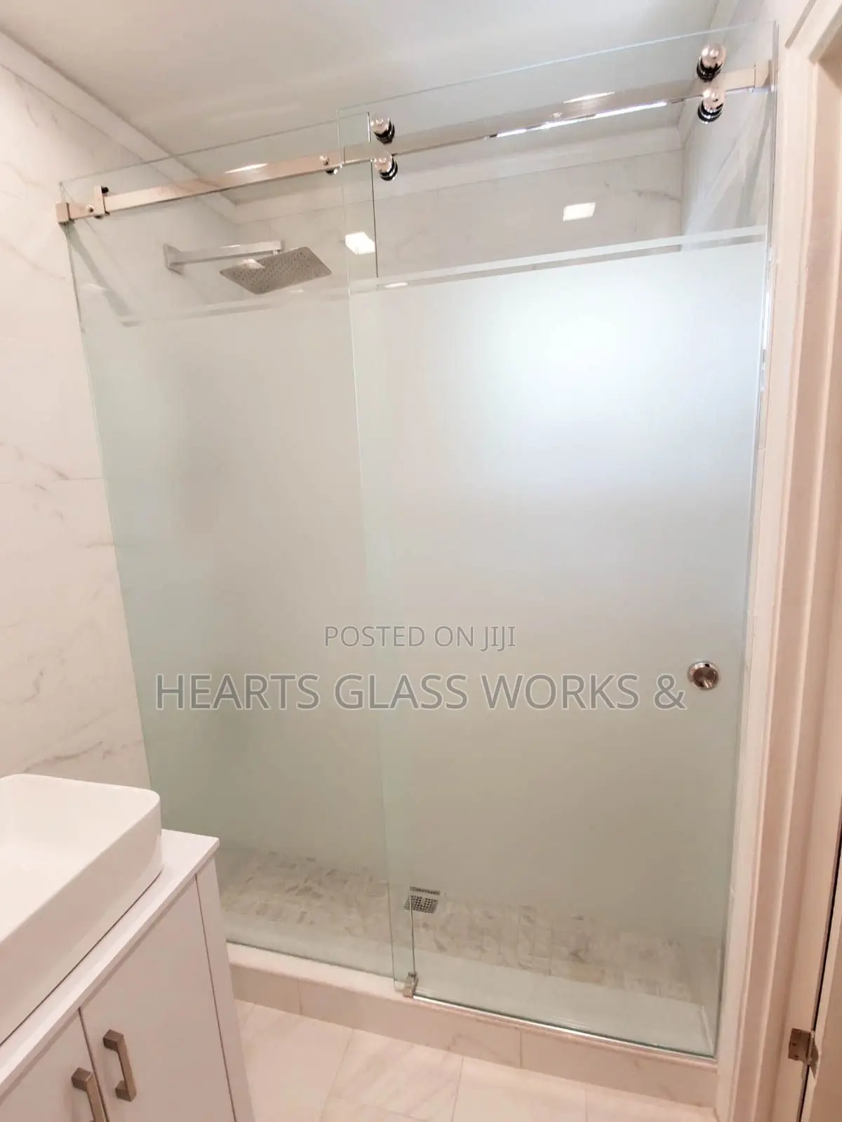 Shower Cubicle Installed With Toughen Glass and Film for Privacy.