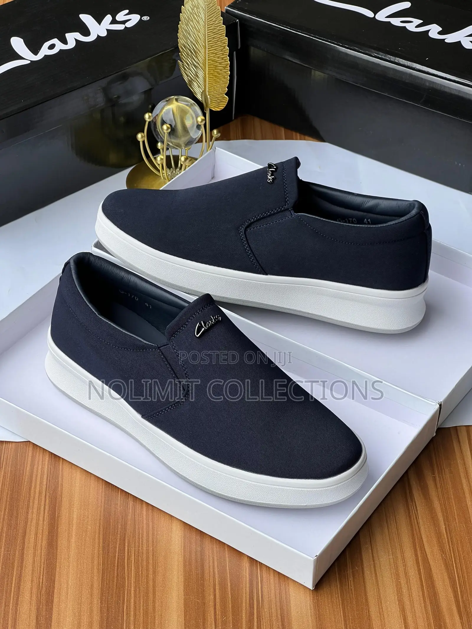 Clarks Men's Slip on Casual Sneakers With White Soles