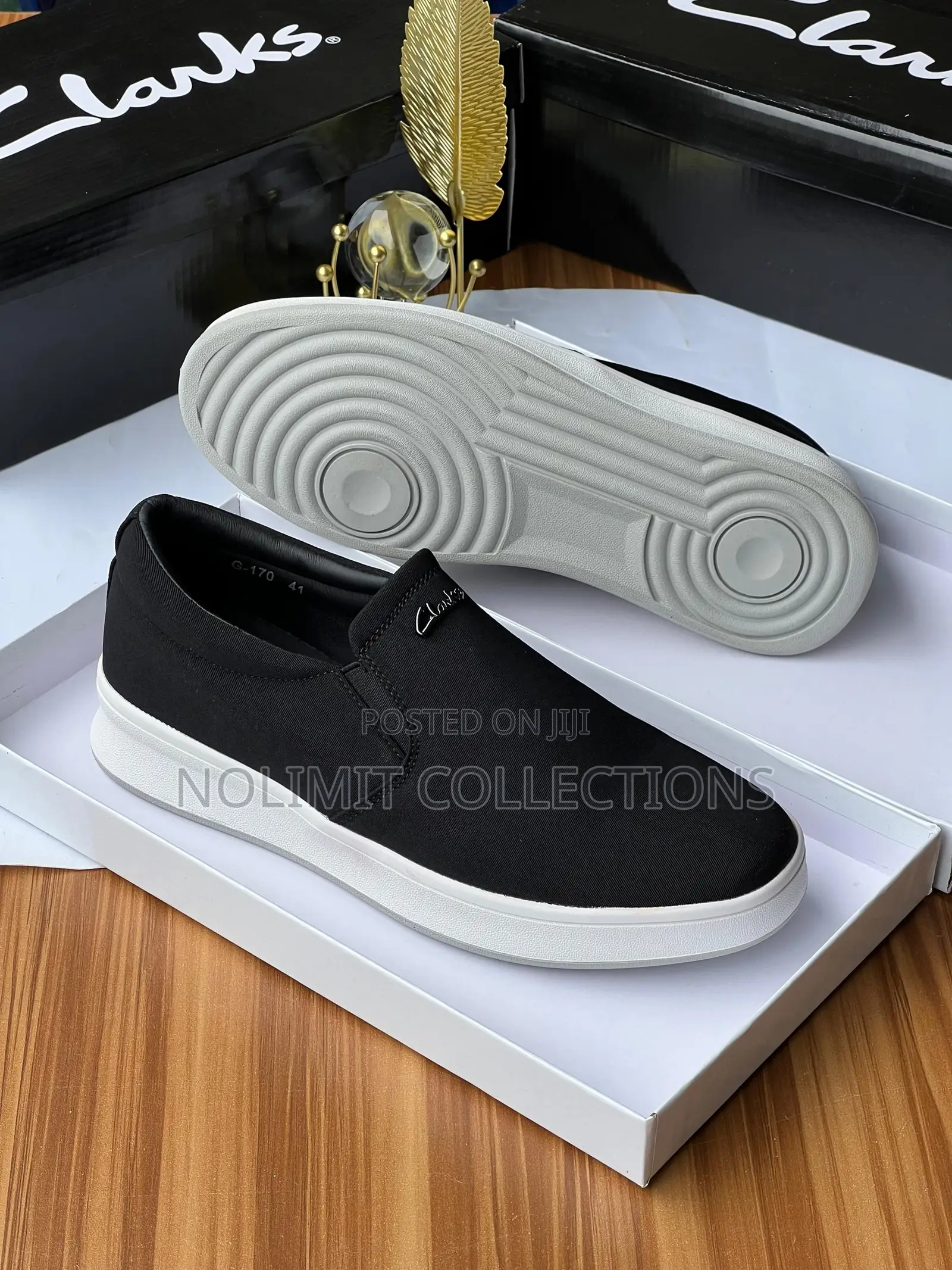 Clarks Men's Slip on Casual Sneakers With White Soles