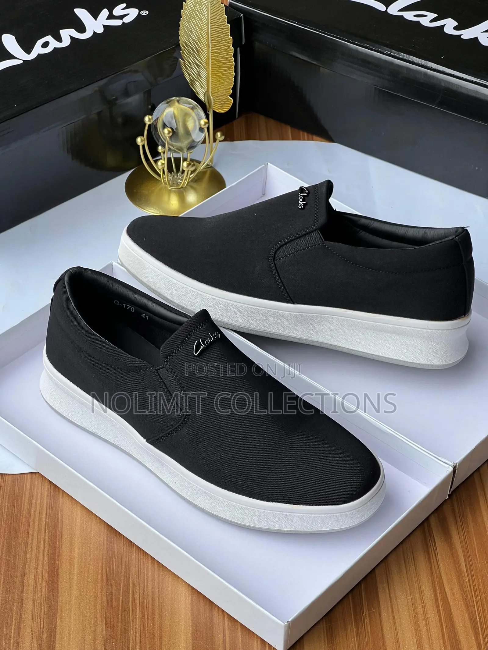 Clarks Men's Slip on Casual Sneakers With White Soles