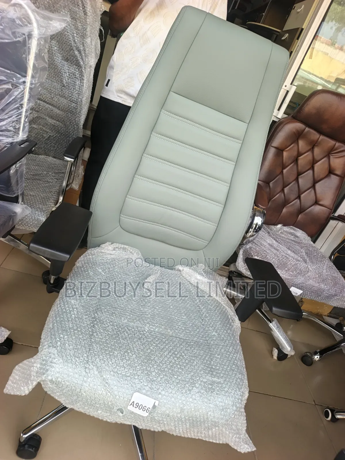 Luxury Executive Office Chair, Swivel and Reclining With Adjustable Ar