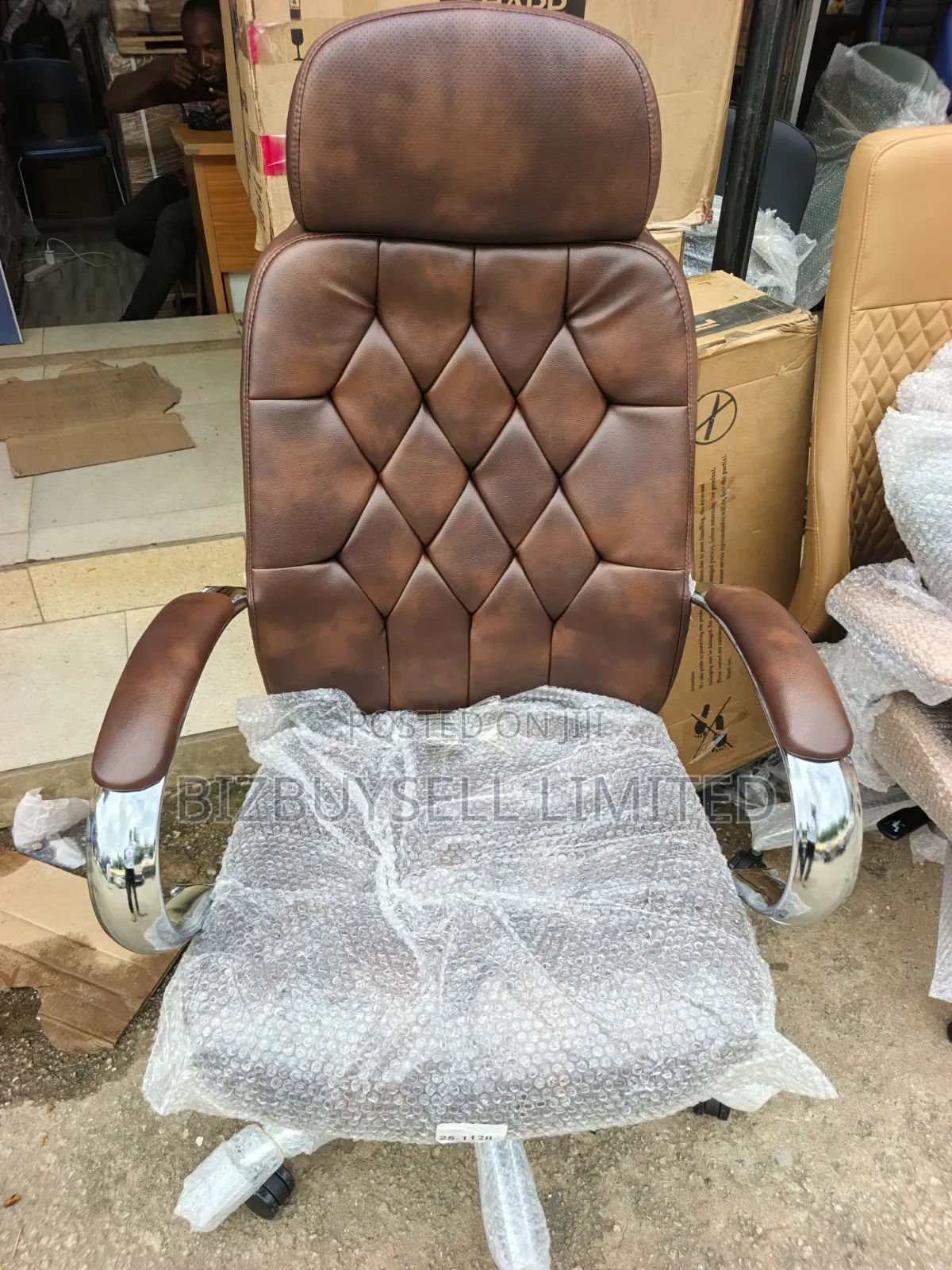 Executive Office Chair, Swivel and Reclining With Headrest.