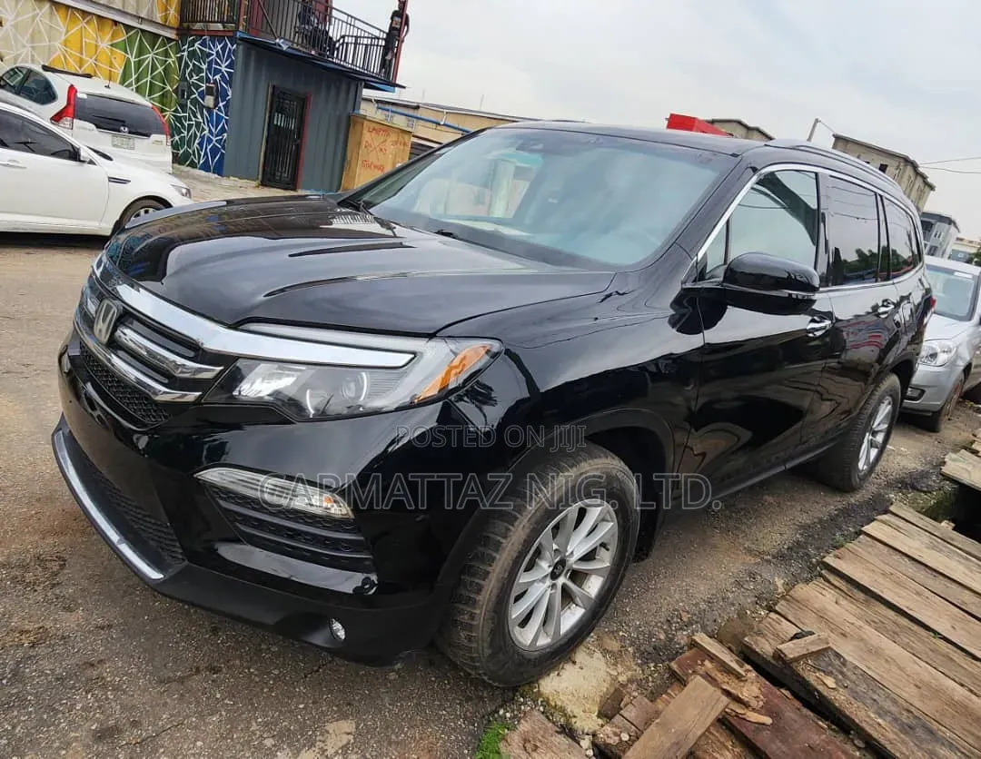 Honda Pilot Touring 4dr SUV 4WD (3.5L 6cyl 9A) 2016 Black
