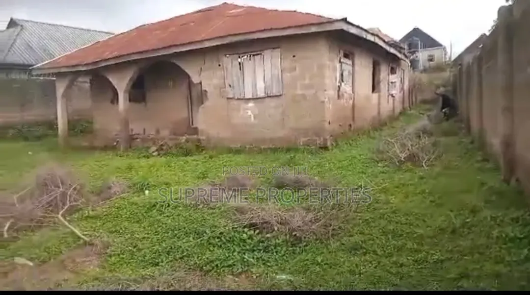 A Standard Plot of Land With a Demolishable Structure on It