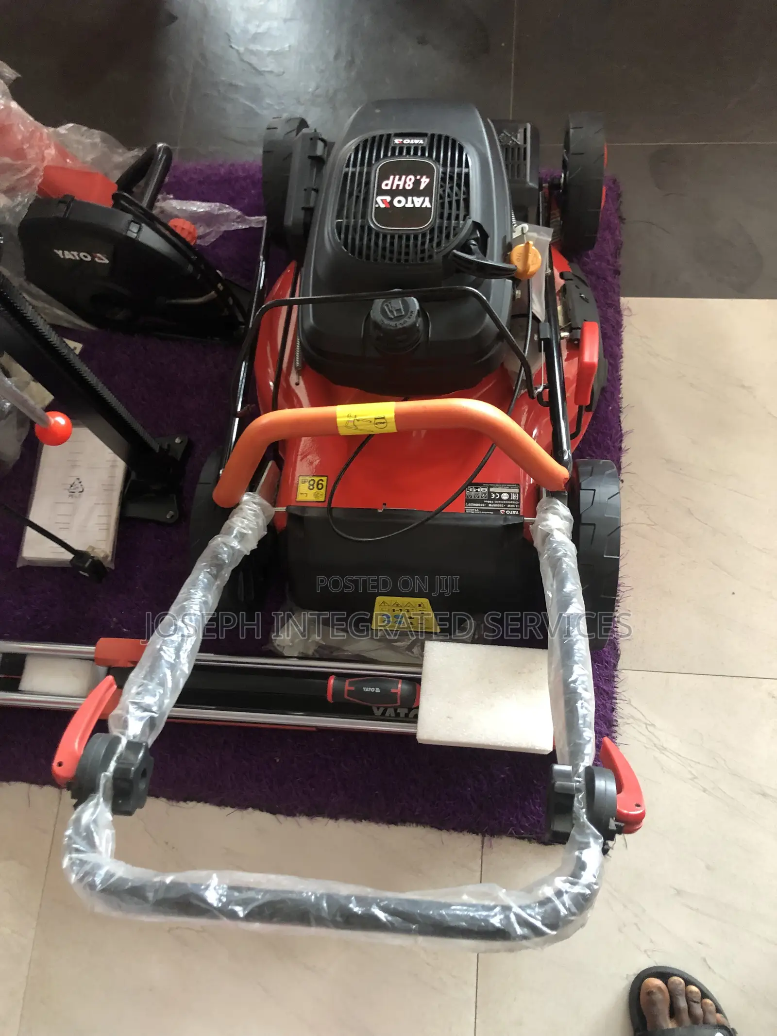 Yato Gasoline-Powered Lawn Mower Featuring a Prominent 4.8HP Engine.