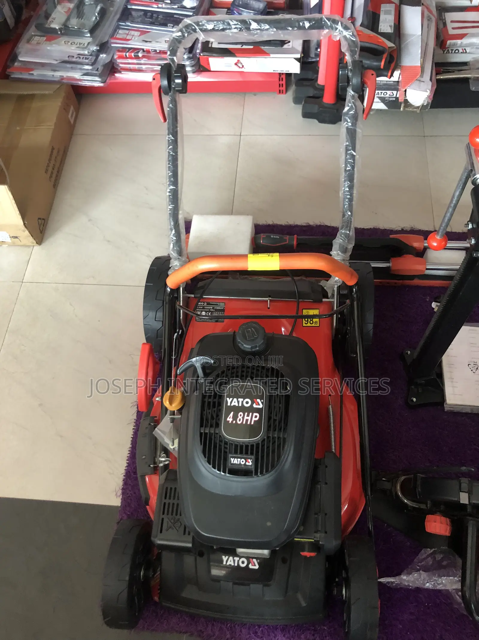 Yato Gasoline-Powered Lawn Mower Featuring a Prominent 4.8HP Engine.