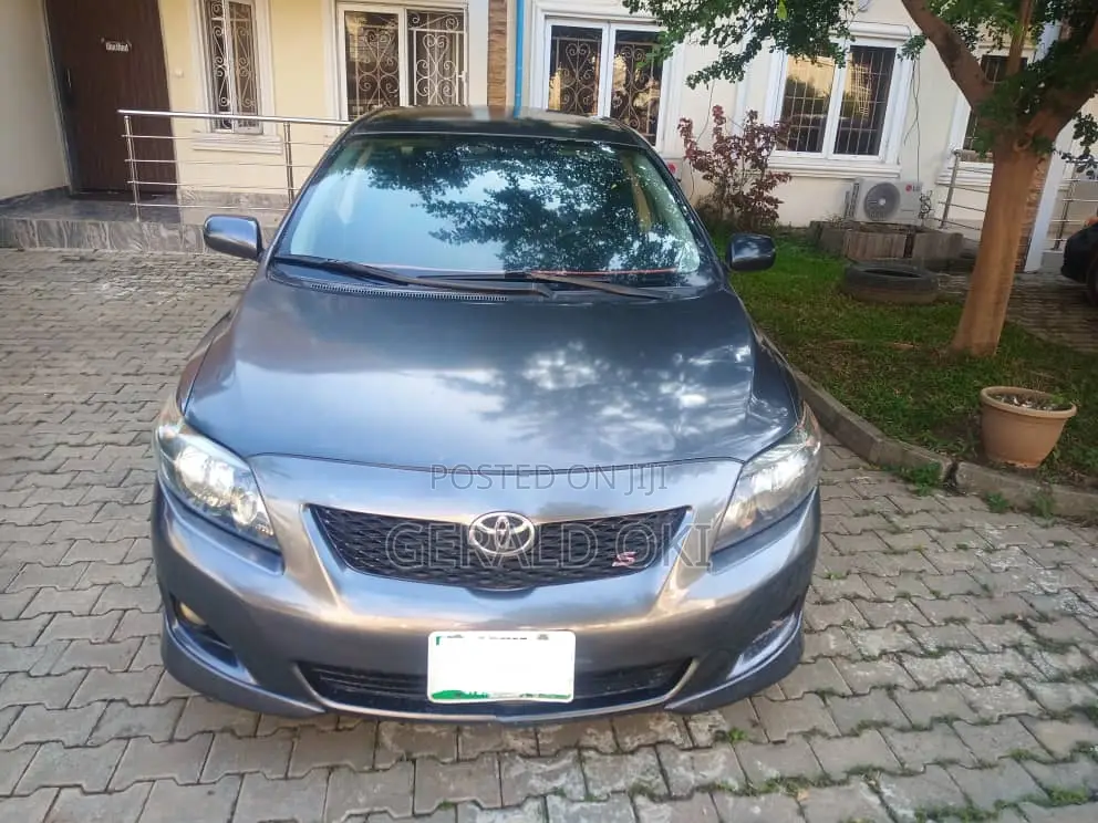 Toyota Corolla Base 4dr Sedan (1.8L 4cyl 5M) 2009 Gray