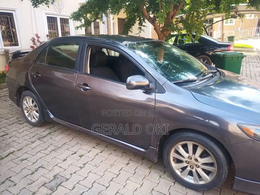 Toyota Corolla Base 4dr Sedan (1.8L 4cyl 5M) 2009 Gray
