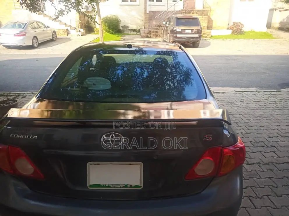 Toyota Corolla Base 4dr Sedan (1.8L 4cyl 5M) 2009 Gray