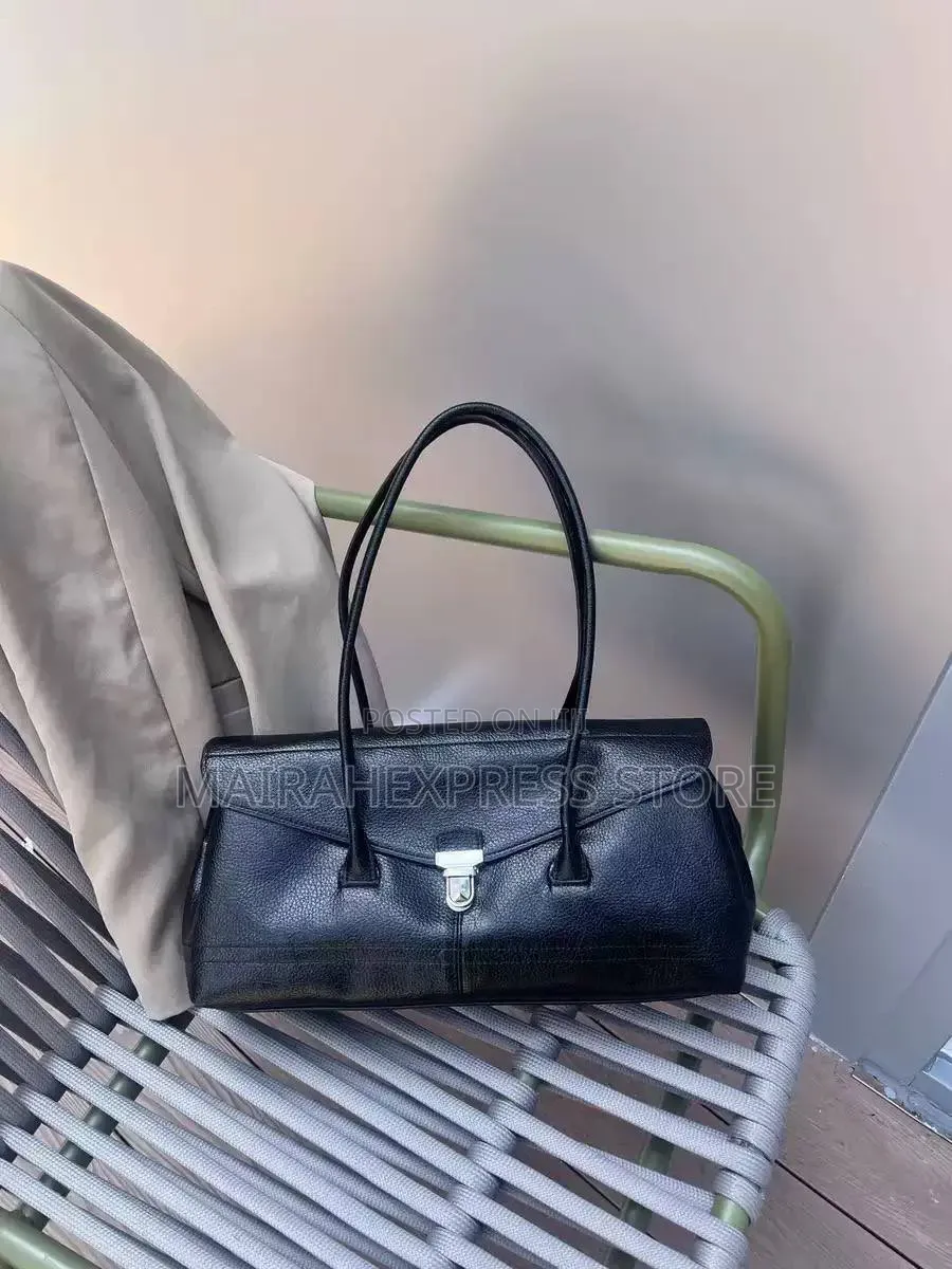 Luxe Genuine Leather Lock-Accent Baguette Shoulder Bag