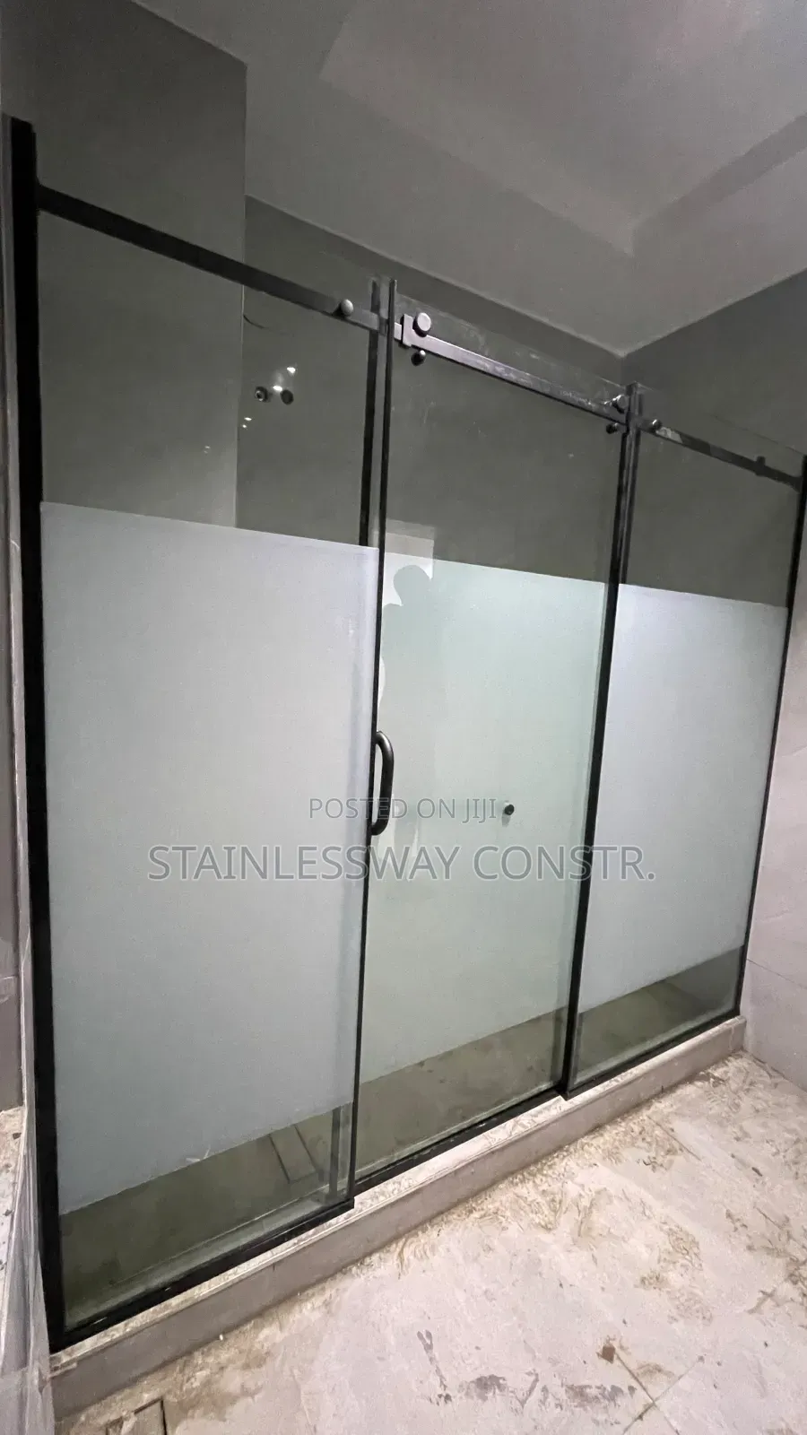 Shower Glass Cubicle With Black Accessories and Middle Frost