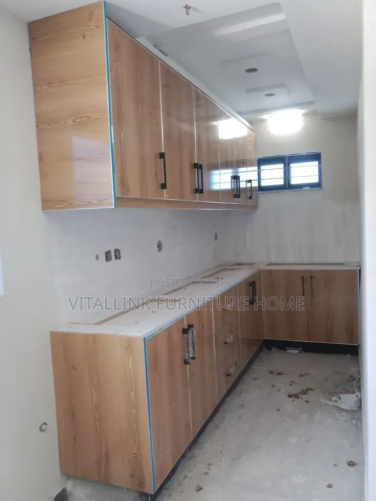 Custom High-Gloss Wood L-Shape Kitchen With Black Handles