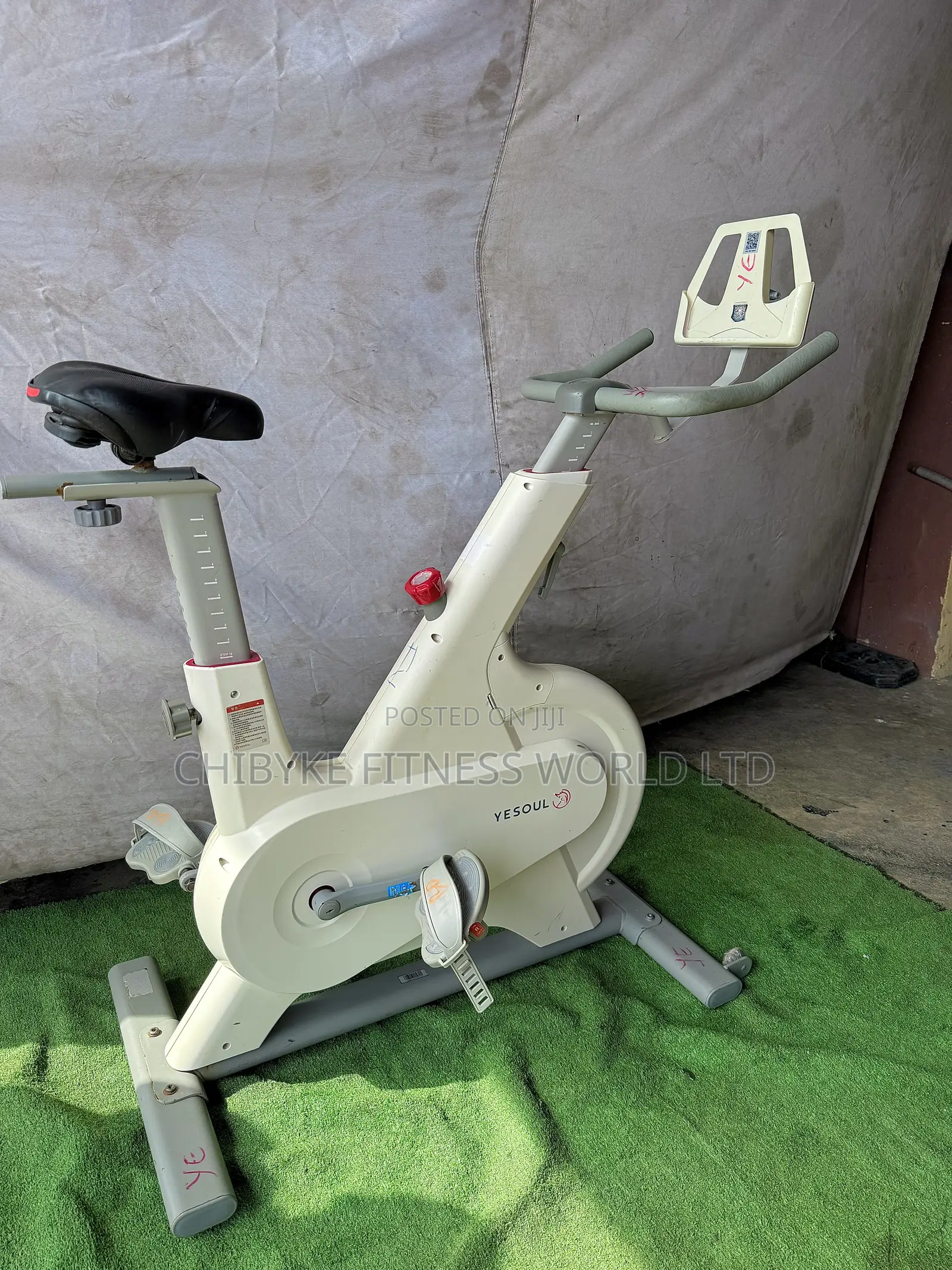 White Commercial Spin Bike With iPad Holder