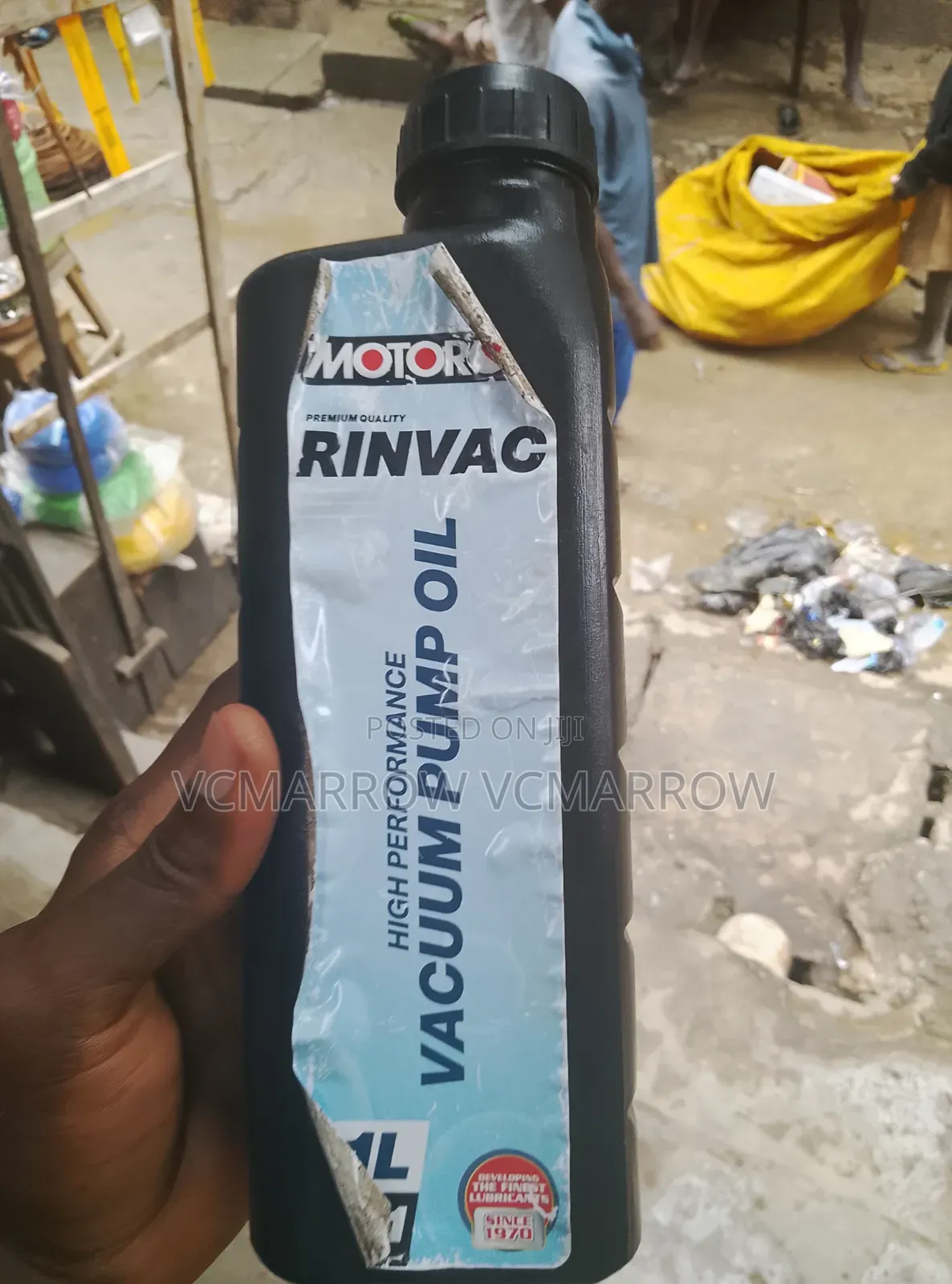 1-Liter Bottle of Motorol Rinvac High-Performance Vacuum Pump Oil.