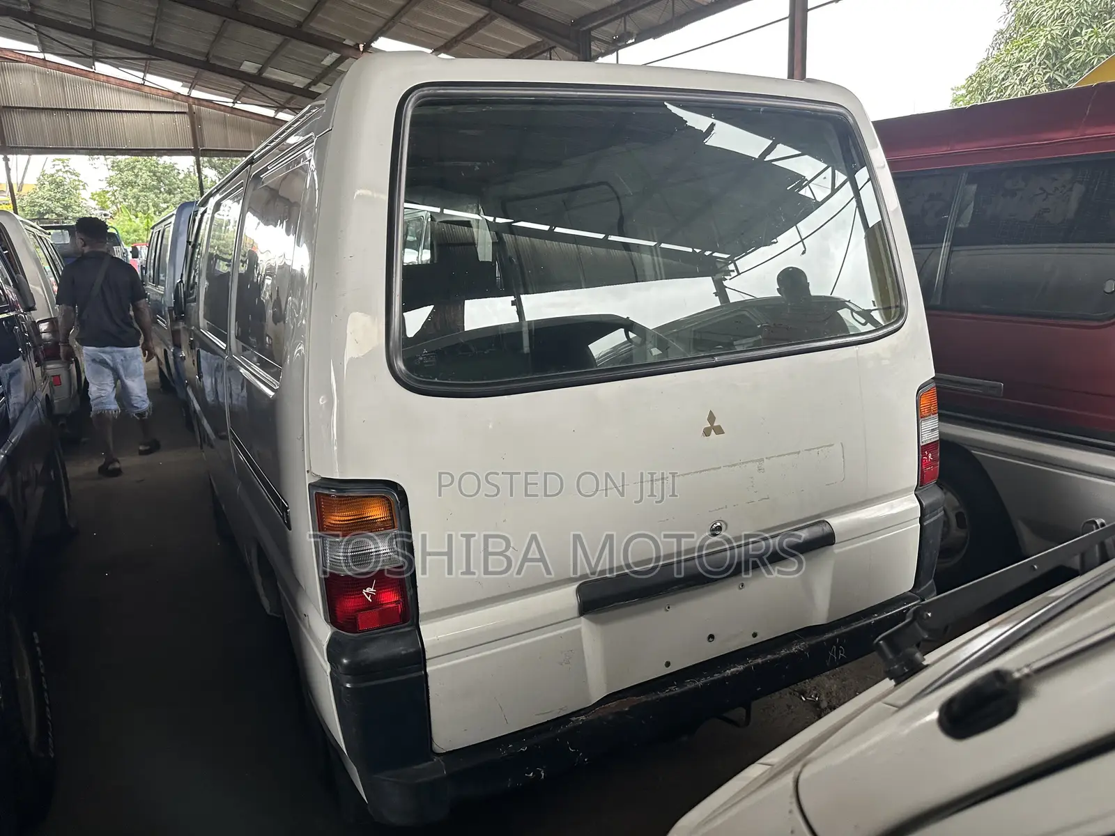 Mitsubishi L300 2004 White