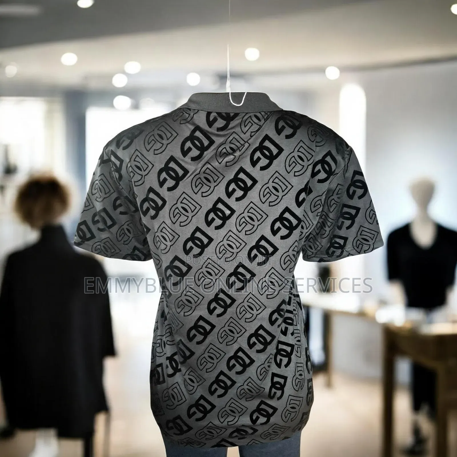 A Black Dolce Gabbana Intarsia Knit Polo Shirt.